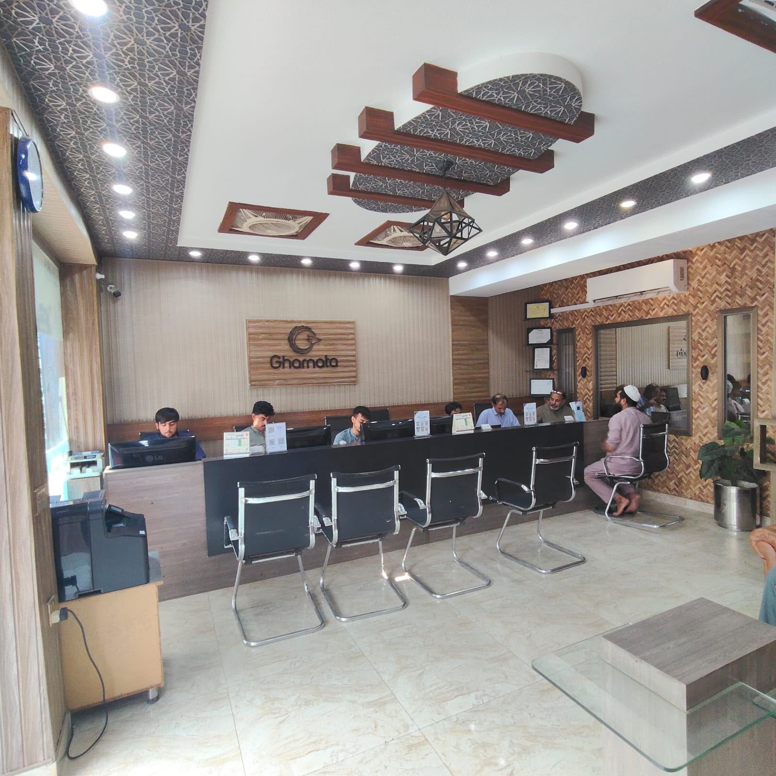 Inside the Gharnata Future Consultant main office in Mandi Bahauddin